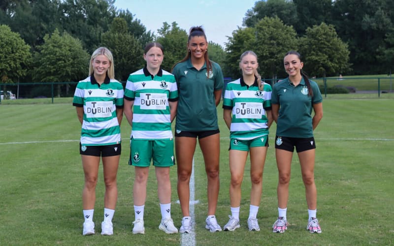 Shamrock Rovers women's football team on the field with TU Dublin partnership.